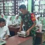 Babinsa Blimbing Dampingi Program Makan Bergizi Gratis di SMPN 16 Malang