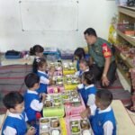 Babinsa Lowokwaru Turut Sukseskan Program Makan Bergizi Gratis di TK Agung Sumbersari