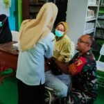Babinsa Wonokoyo Sukseskan Gerakan Vaksinasi Campak Serentak