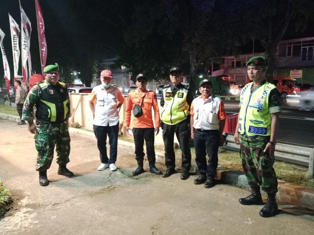 Sigap Personel Koramil Kedungkandang Amankan Exit Tol Madyopuro Jelang Idul Fitri