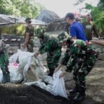 Kowad Kodim 0833 Bantu Pembangunan Jembatan Perintis Garuda di Klojen