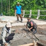 IMG-20260525-WA0045 Jalan Penyambung Jembatan Perintis Garuda Bakalkrajan Mulai Dicor
