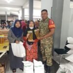 Babinsa Karangbesuki Kawal Penyaluran Bantuan Pangan Tahap II Tahun 2026 untuk 629 KPM.
