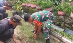 IMG-20260719-WA0071 Wujud Kepedulian Lingkungan, Babinsa Koramil Blimbing Gotong Royong Bersama Warga Arjosari