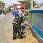 IMG-20260811-WA0036 Babinsa Buring Bersama Bhabinkamtibmas dan Warga Bersihkan Makam Muslim Gedangan