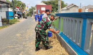 IMG-20260811-WA0036 Babinsa Buring Bersama Bhabinkamtibmas dan Warga Bersihkan Makam Muslim Gedangan