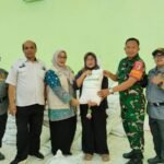 IMG-20260827-WA0117 Babinsa Polowijen Dampingi Penyaluran Bantuan Pangan, 606 KPM Terima Beras 30 Kilogram